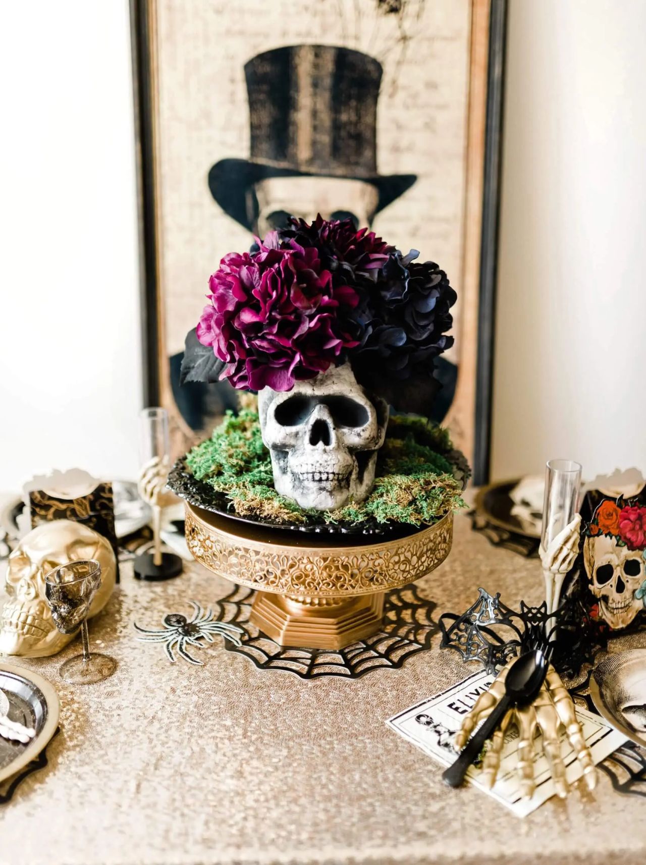 gothic style Halloween table centerpiece with skull and flowers