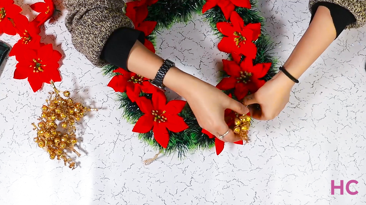 DIY Poinsettia Wreath Tutorial - add golden berries