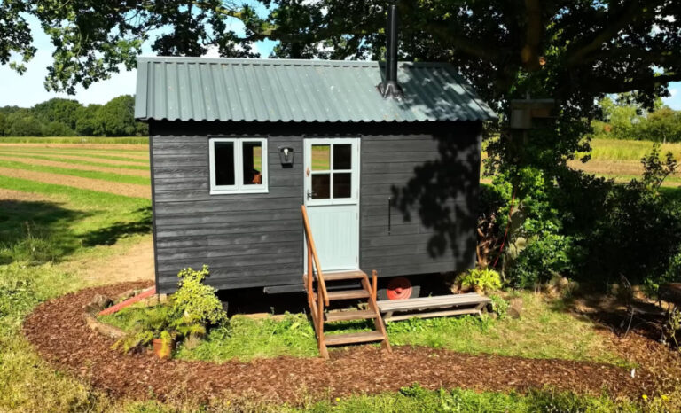 This Tiny House Flaunts a Split Level Kitchen and Office Nook