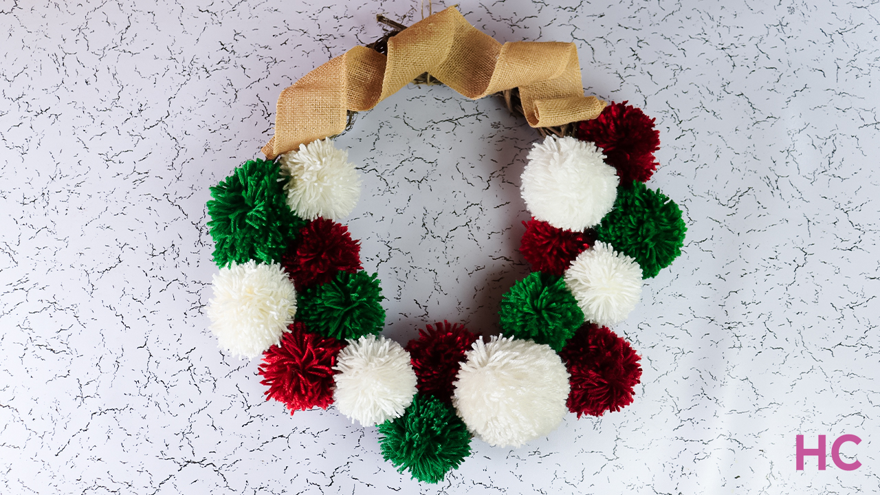 DIY Yarn Christmas Pom Pom Wreath - That Craft Site - fun and easy DIY  tutorials