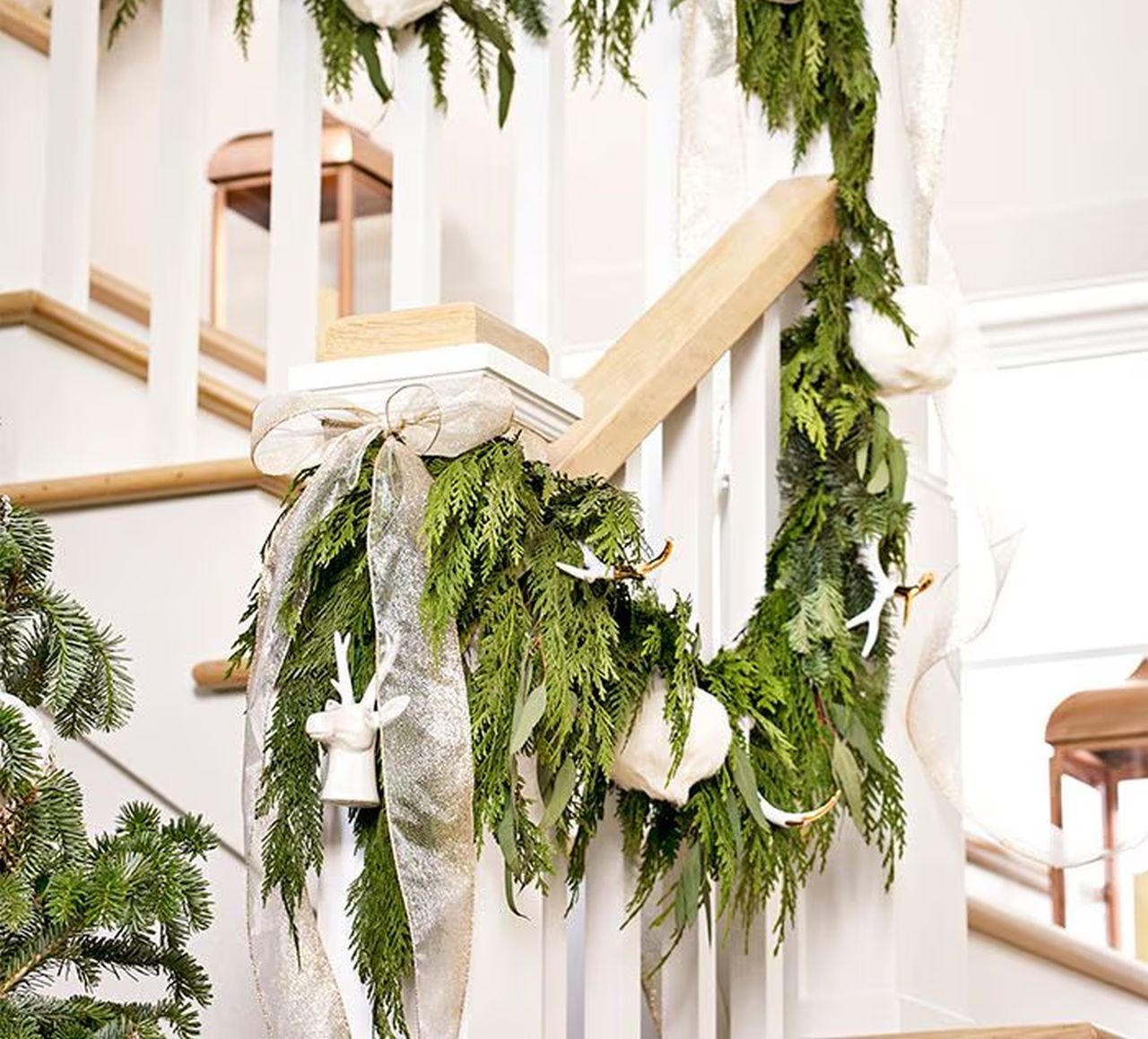 Christmas Staircase Decoration Ideas - cypress garland with organza bows