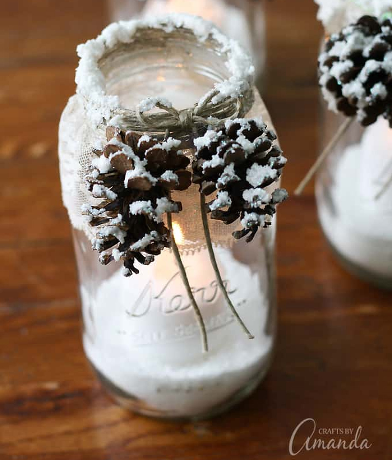 Frosted Glass jar Decorated With Flocked Pinecones and Electric tea Light