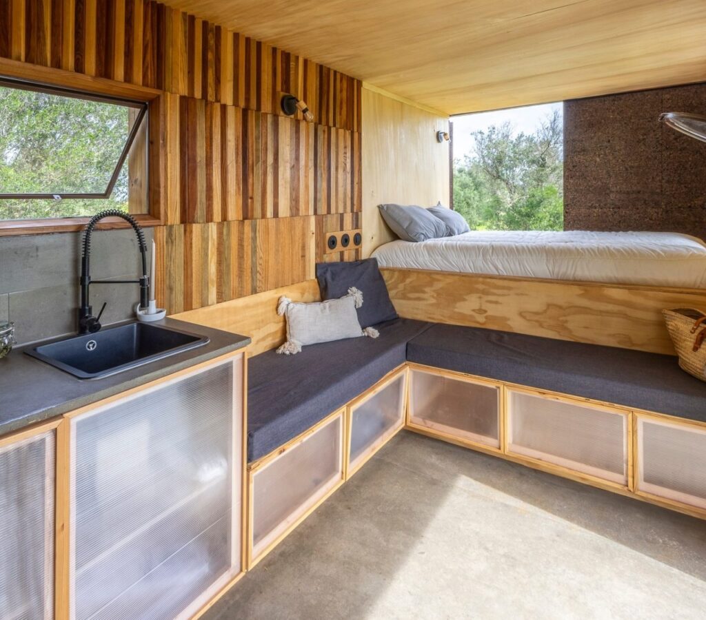 Cargo Tiny House has Swinging Doors in Bedroom, Rooftop Lounge