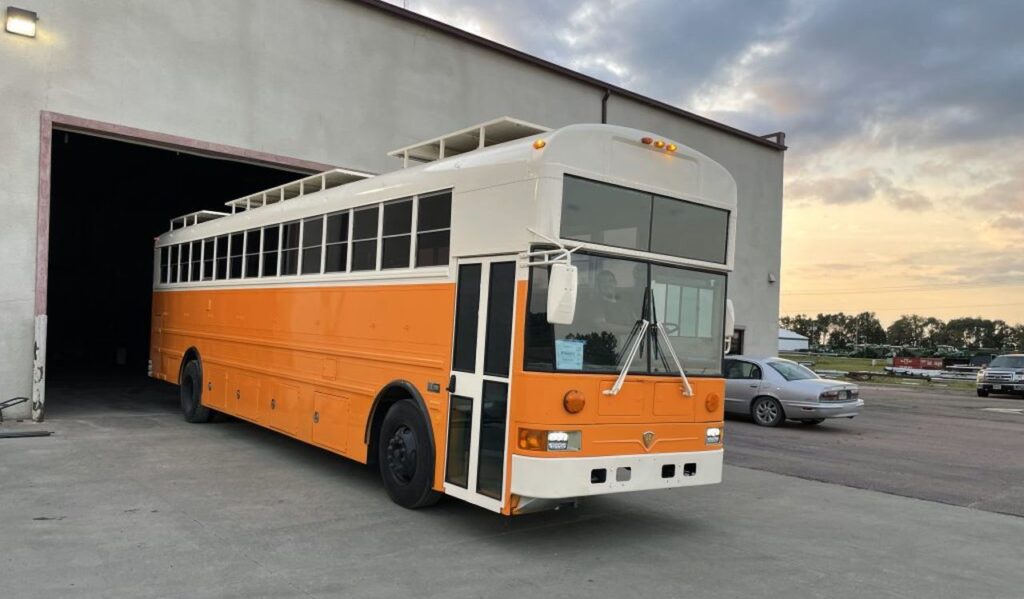 Couple DIYs Skoolie Into Home on Wheels With Myriad of Storage