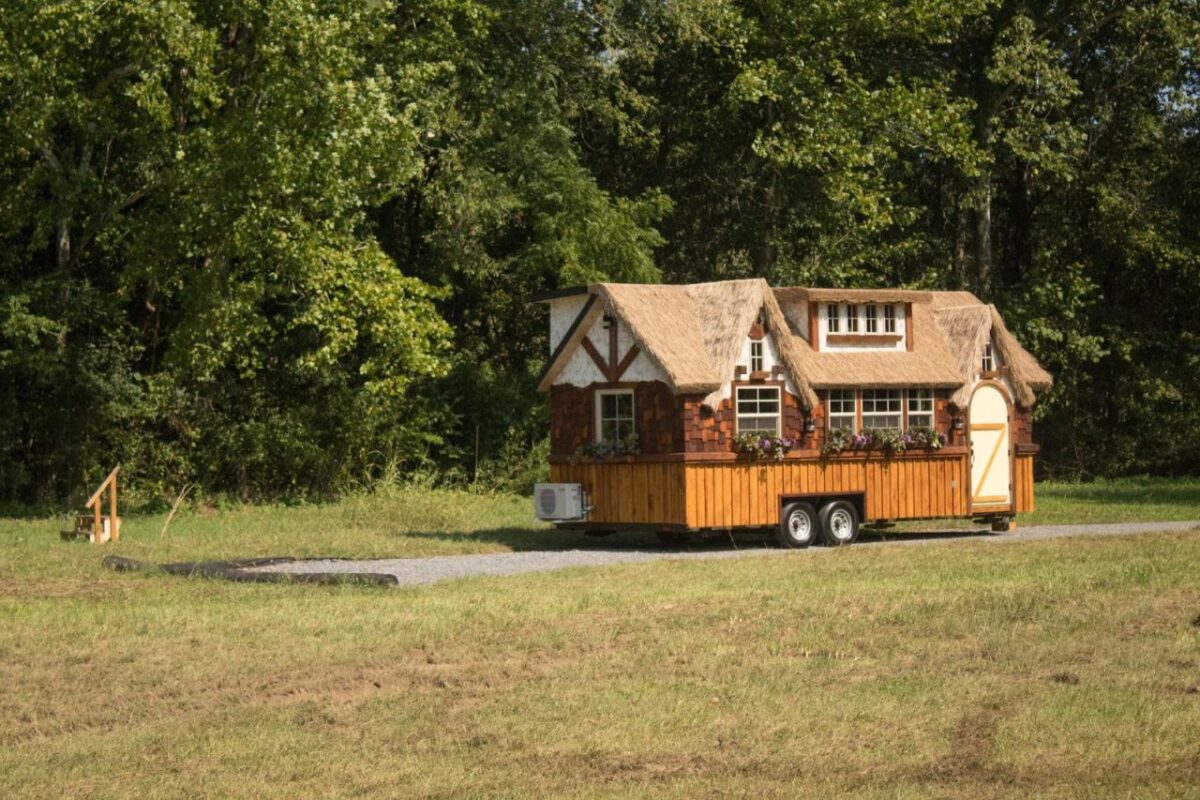 Highland Tiny House is Thatched Roof Cottage With Murphy Bed
