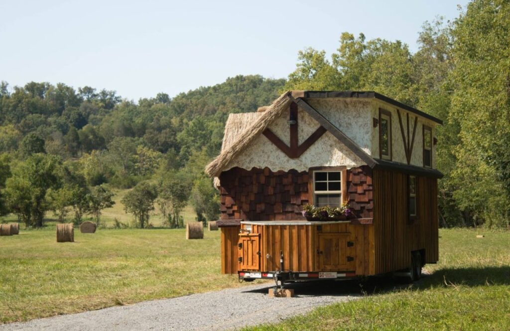 Highland Tiny House is Thatched Roof Cottage With Murphy Bed