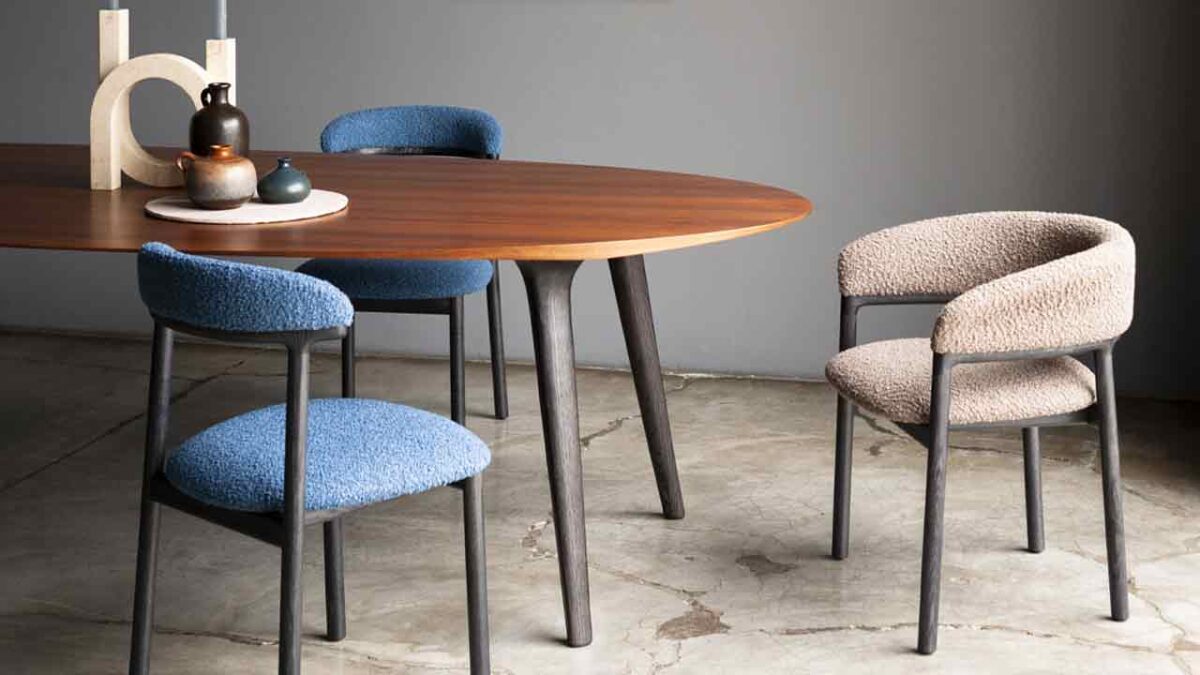 Lindy Seating Collection has Distinct Upholstered Curved Wood Backrest