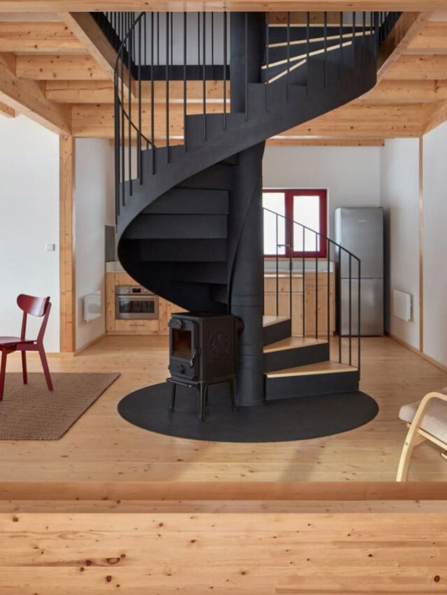 This Mountain Cabin has Spiral Staircase Around its Fireplace