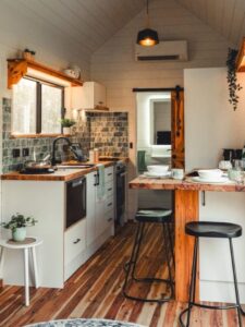 tiny house Kitchen-with-tiled-backsplash