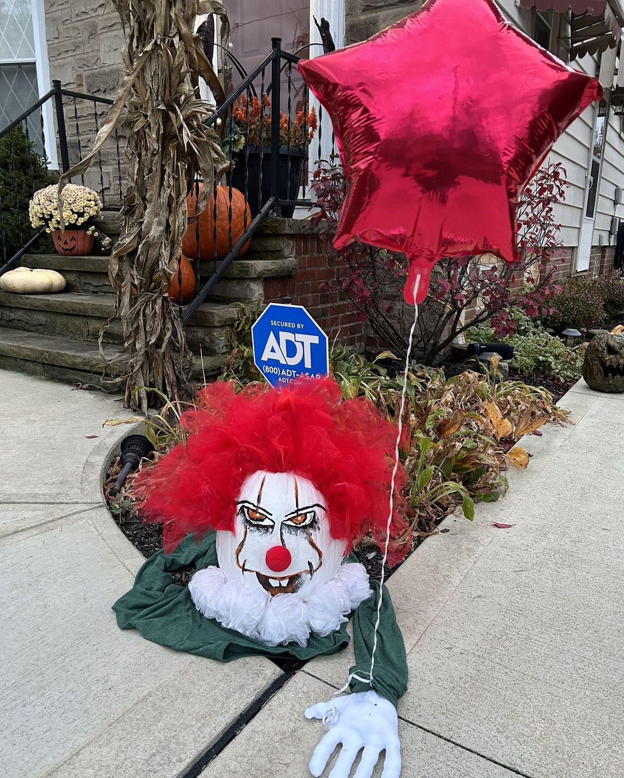Scary clown with a balloon