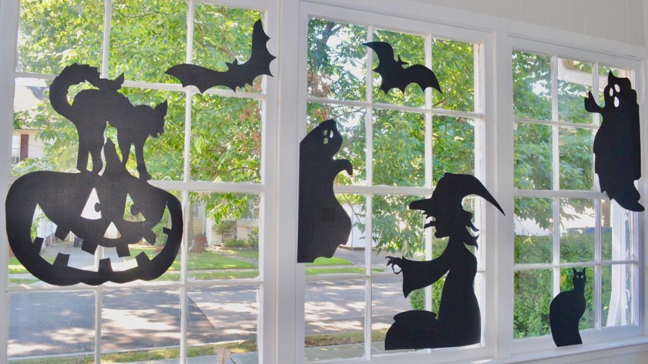 Best Halloween Decoration Ideas - witchy party on the window pane