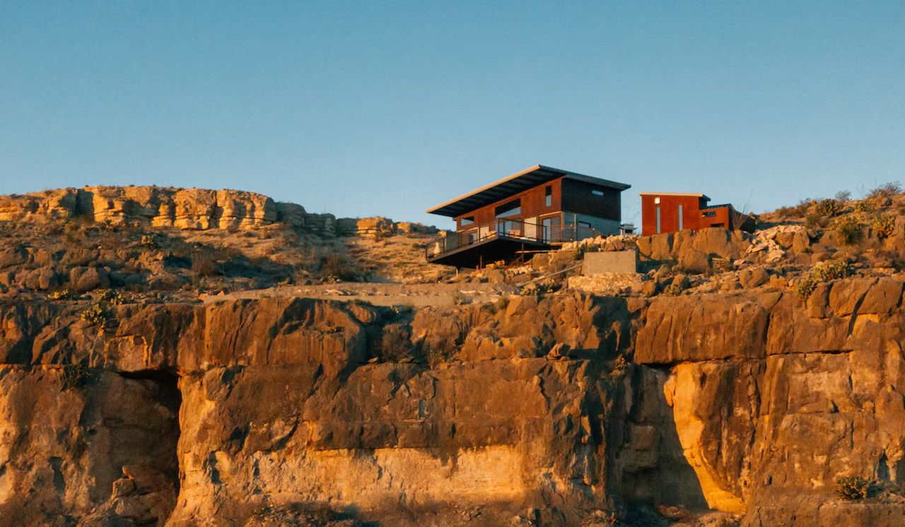 Perch fully off-grid cabin-inspired home 