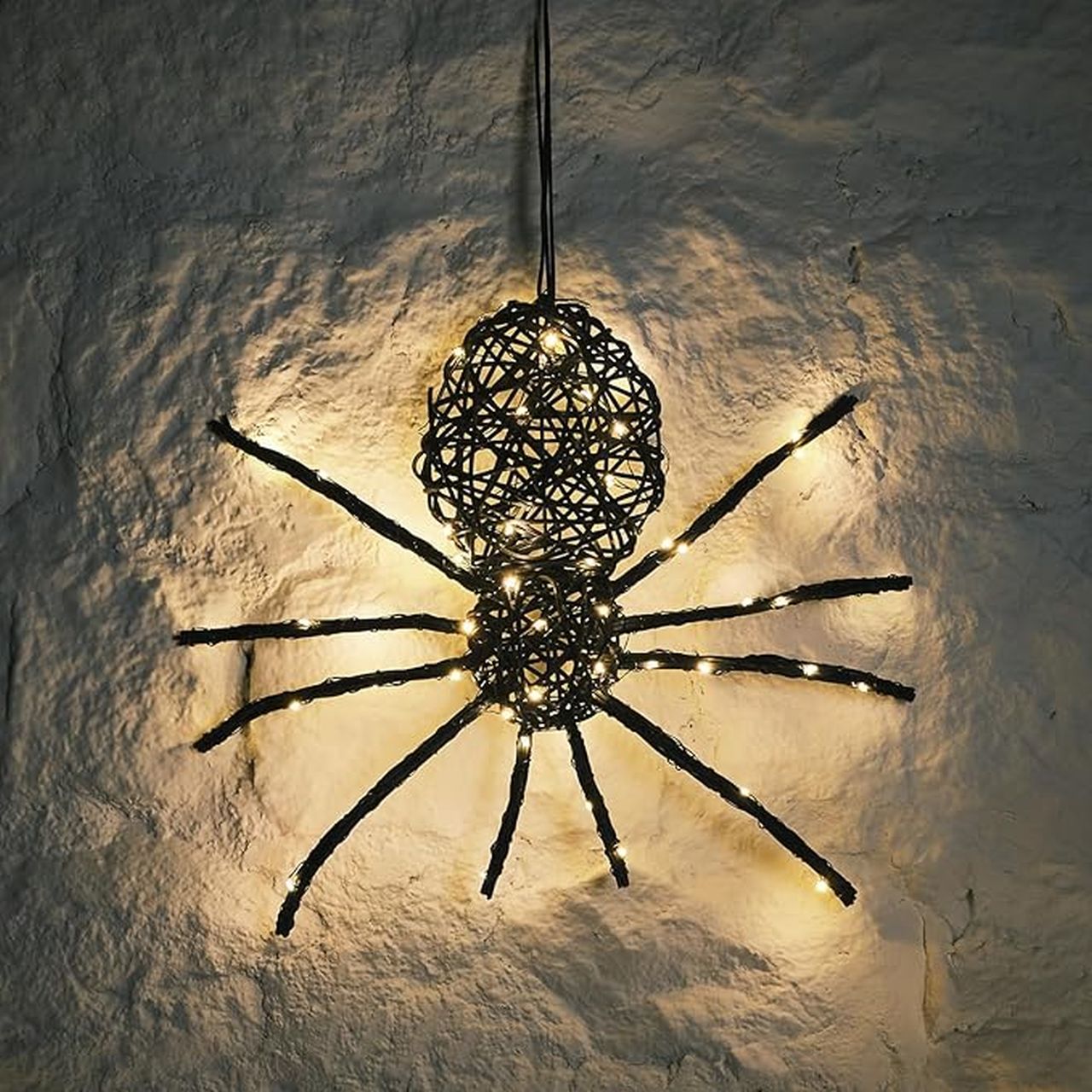 Spiders falling from the light fixtures