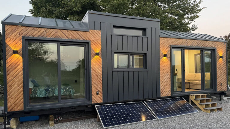 Steel Frame Tiny House has Downstairs Bedroom, Versatile Loft