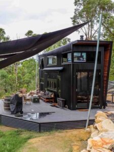 Couple Goals- Aussie Couple Builds A Stunning Tiny House= in middle of forest