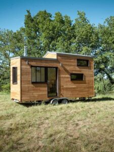 Dining table turns into bed in a tiny house