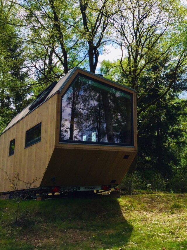 German Tiny House Airbnb has Bed by the Panoramic Window