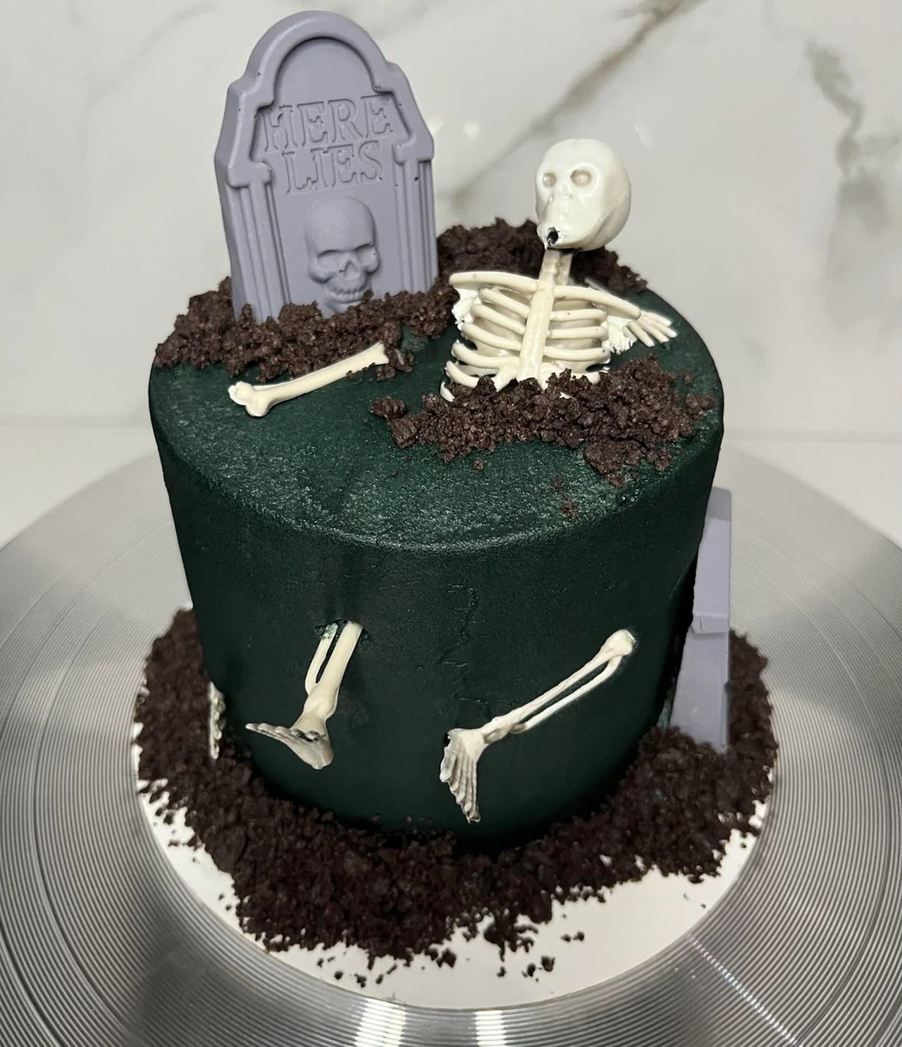 Mini graveyard cake with skeleton for Halloween