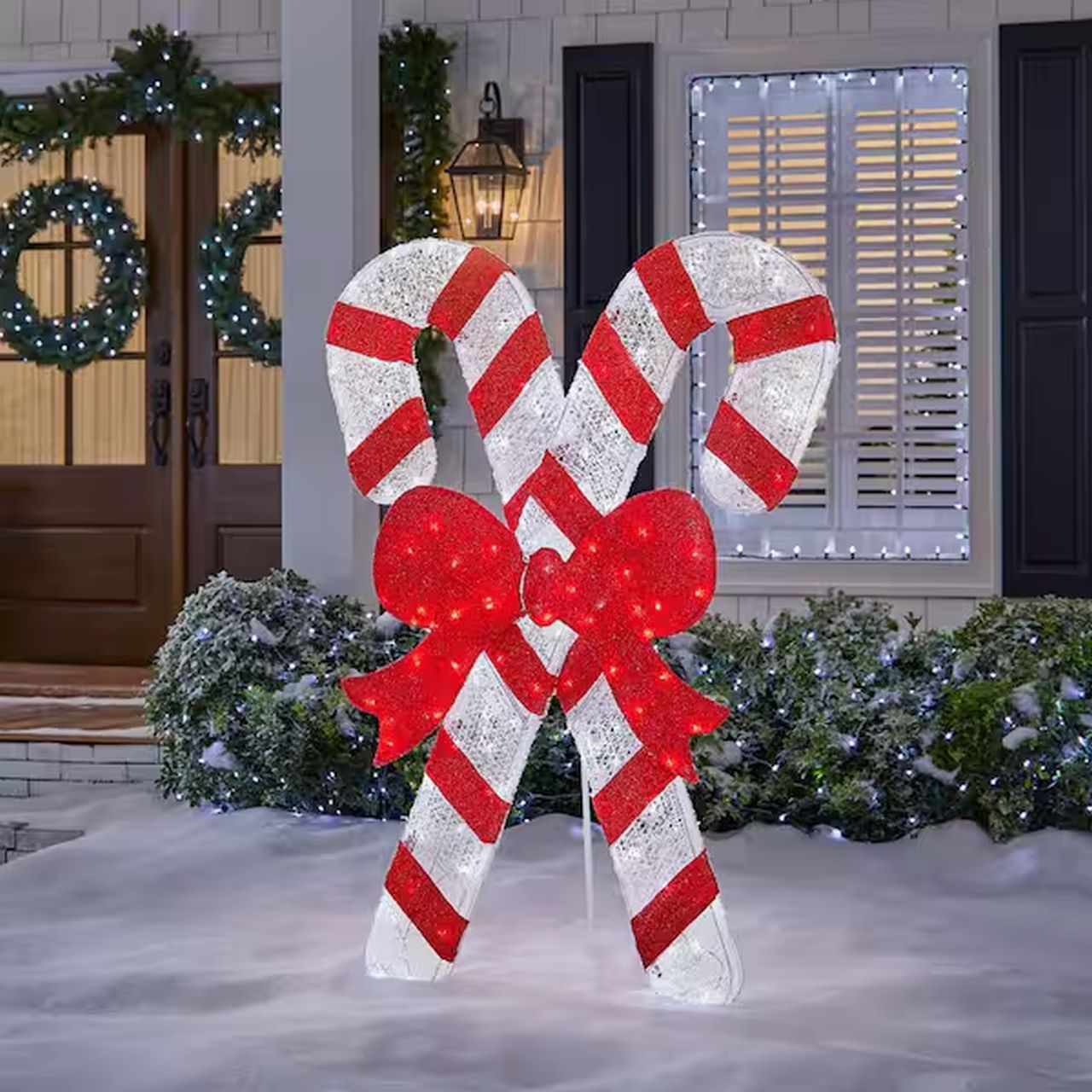 5ft icicle Shimmering LED Candy Canes With Red Bow