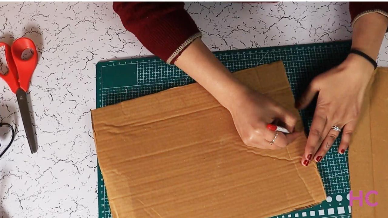 DIY cardboard gingerbread house display - 1