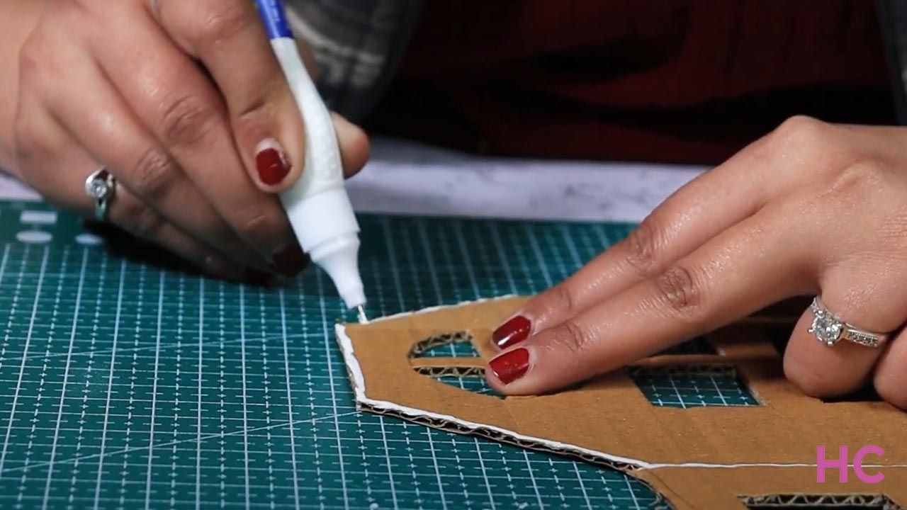 DIY cardboard gingerbread house display- 8