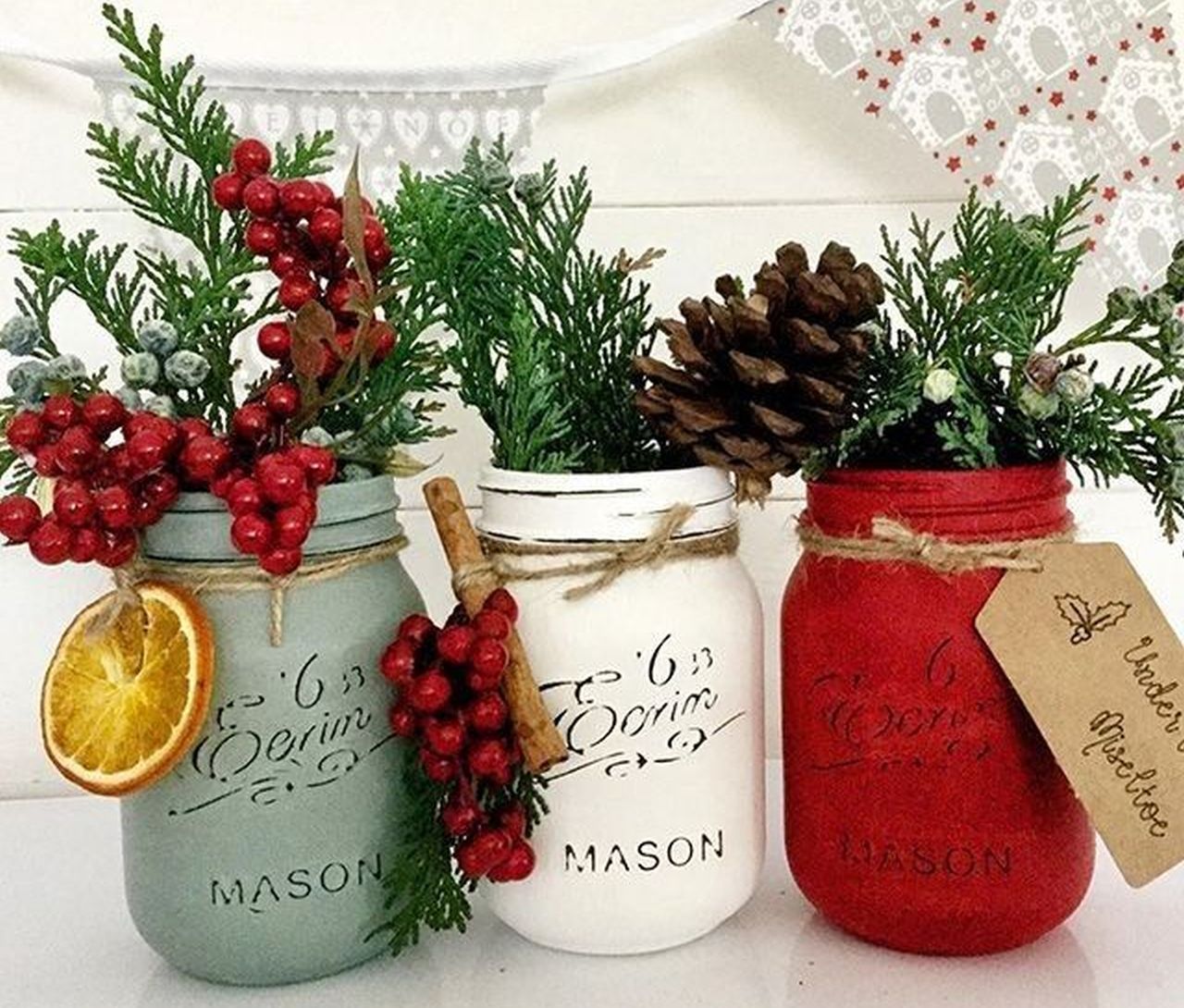 Mason Jar With Pines and Berries Decoration