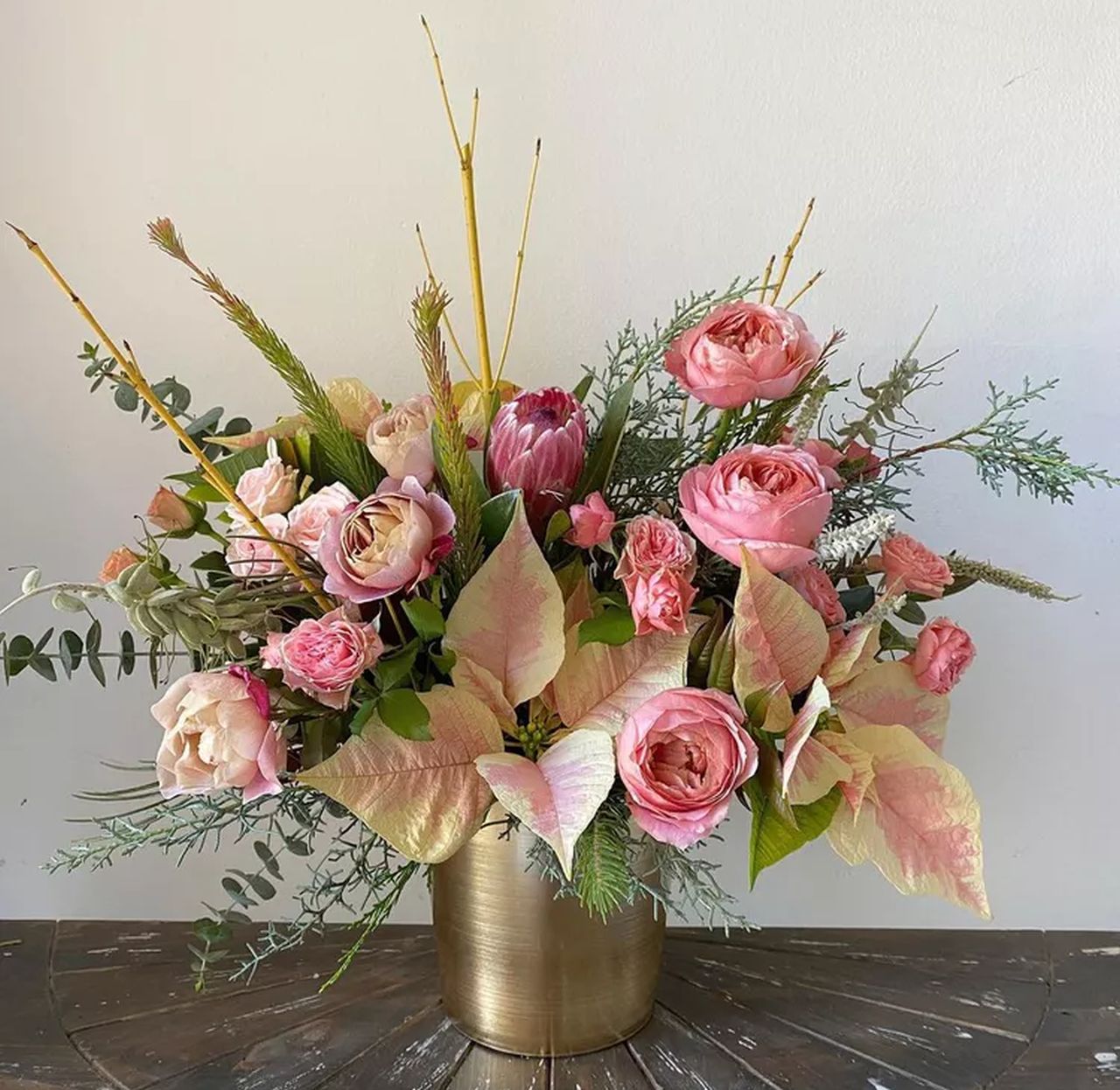 Mixed Floral Arrangement Using Poinsettias