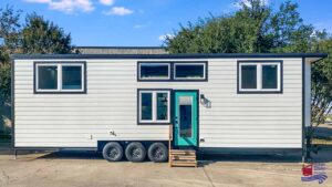 Sandy tiny house on wheels by Indigo River Tiny Homes