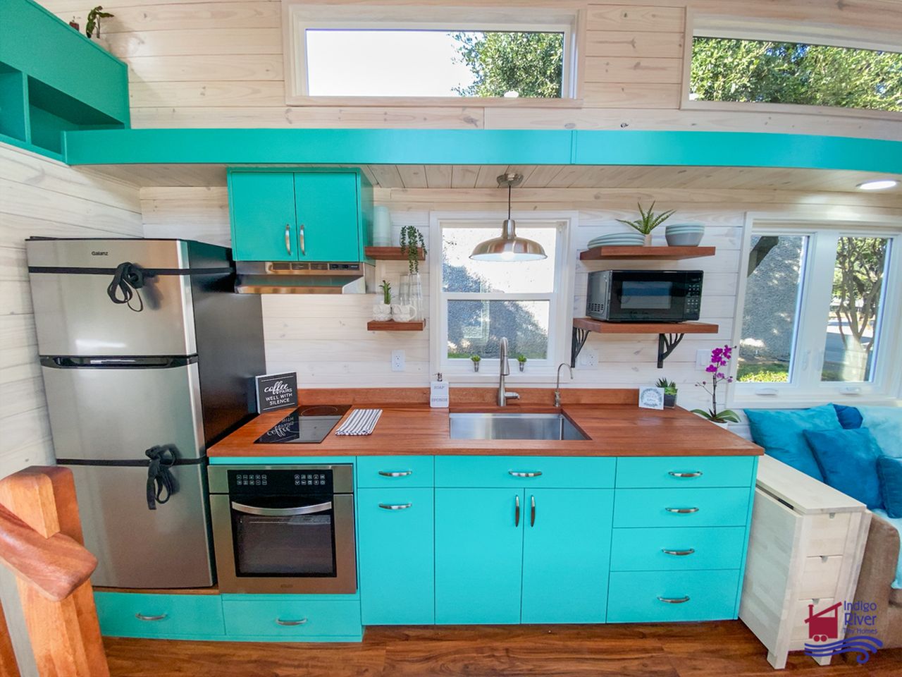 Sandy tiny house on wheels by Indigo River Tiny Homes