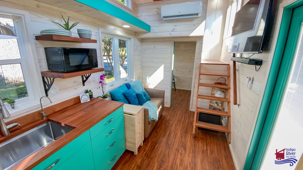 Sandy tiny house on wheels by Indigo River Tiny Homes