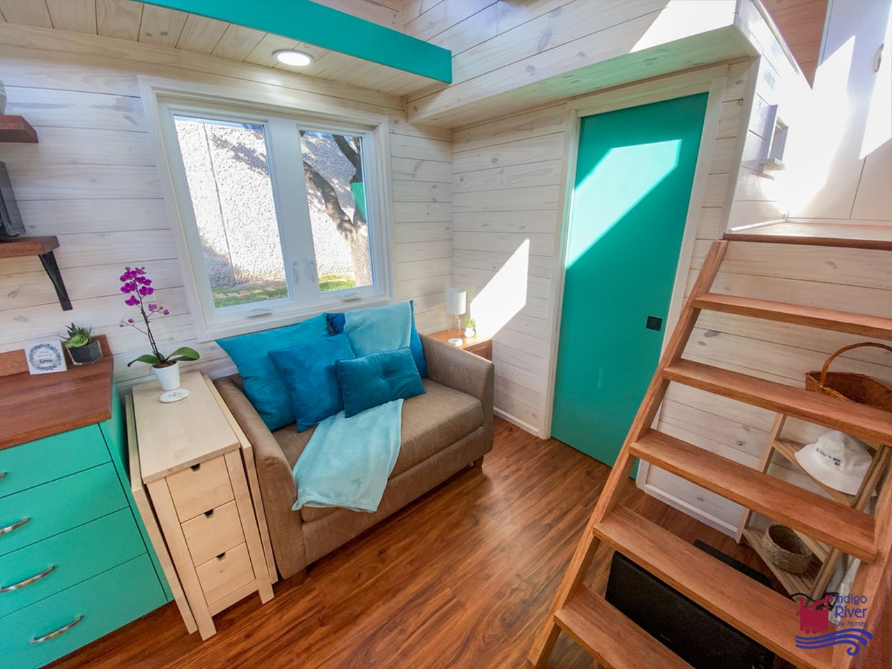 Sandy tiny house on wheels by Indigo River Tiny Homes