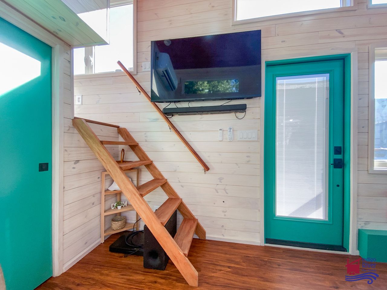 Sandy tiny house on wheels by Indigo River Tiny Homes