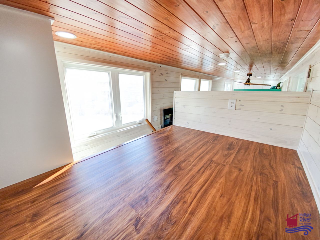 Sandy tiny house on wheels by Indigo River Tiny Homes