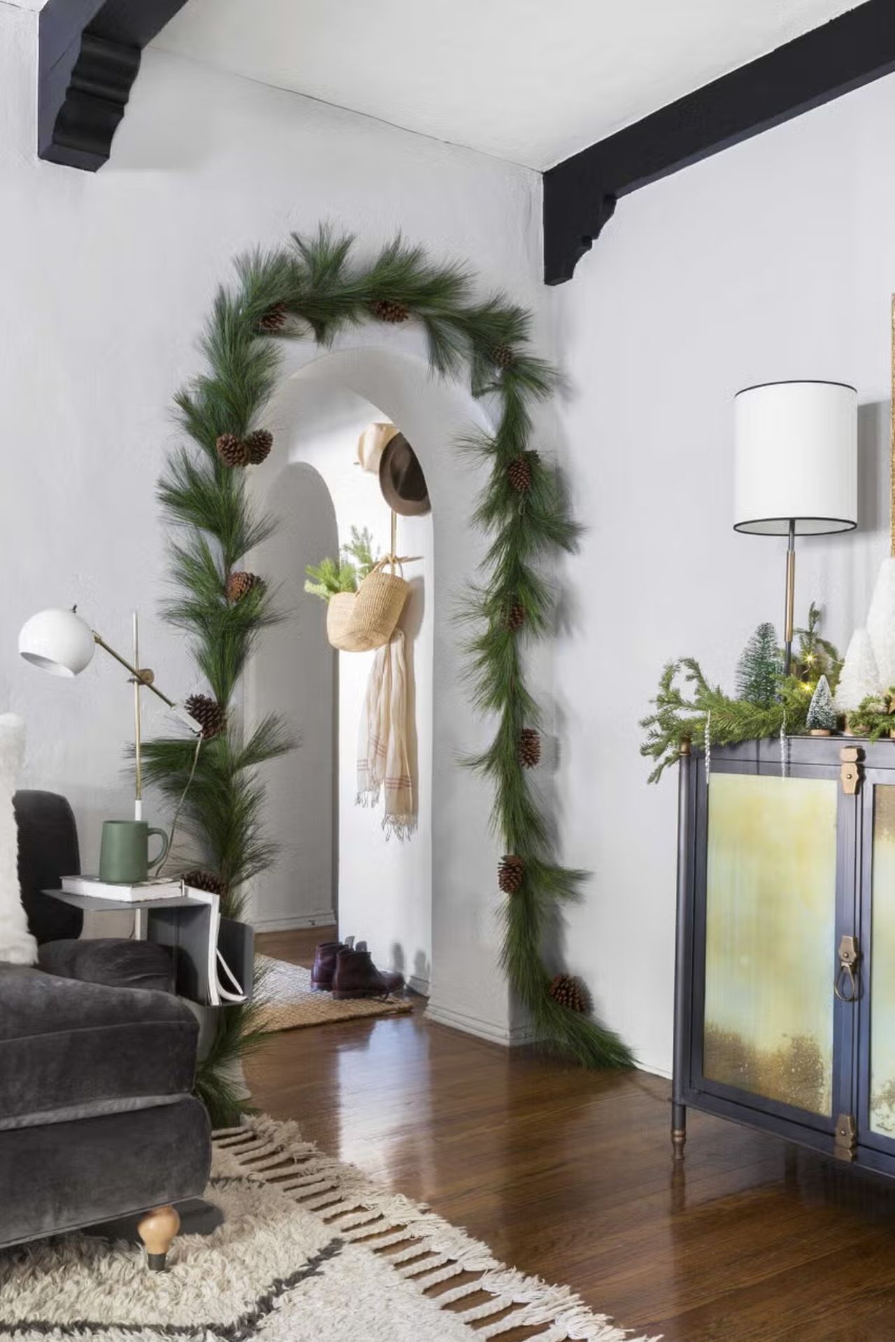 entryway with a festive garland