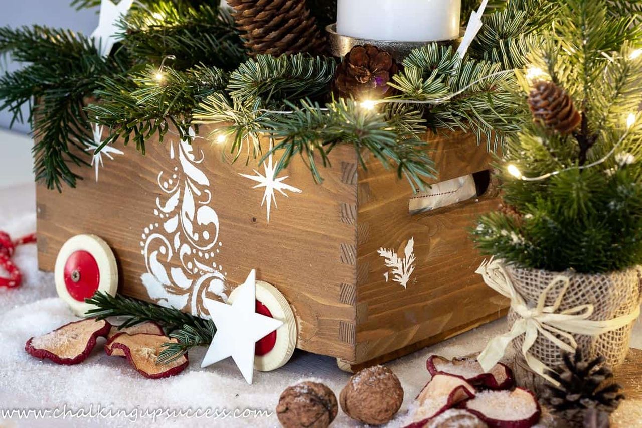 wooden crate filled with pine branches