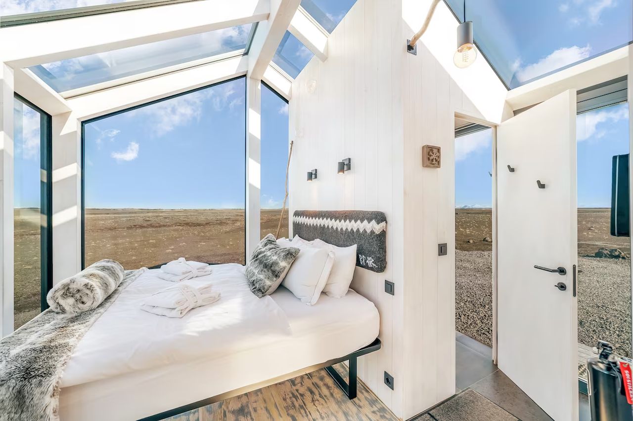 Best Airbnbs to Spot Northern Lights - Modern Glass Cottage in Hella, Iceland 1