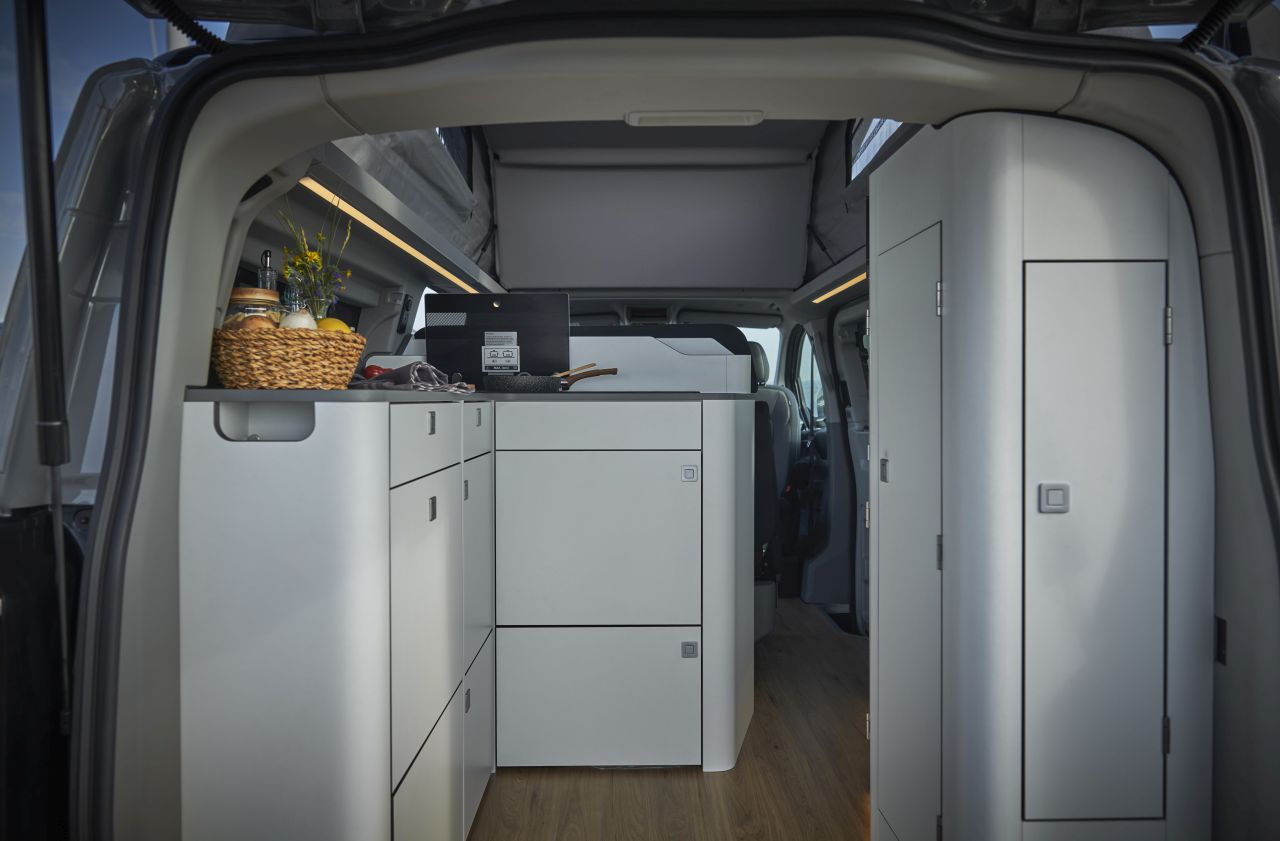 Ford Nugget Campervan With Longer Wheelbase Features Larger Kitchen and a Built-in Toilet - kitchen storage area