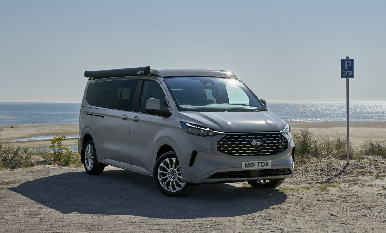 Ford Nugget Campervan With Longer Wheelbase Features Larger Kitchen and a Built-in Toilet -closed rooftop tent