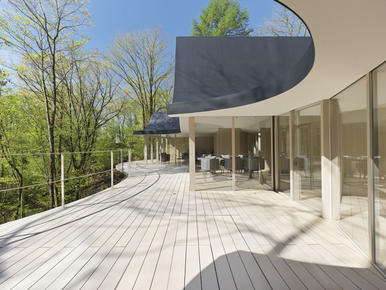 Nendo Builds Weekend House that Consists of Six Cottages, Intertwined With a Terrace and Roof - large deck