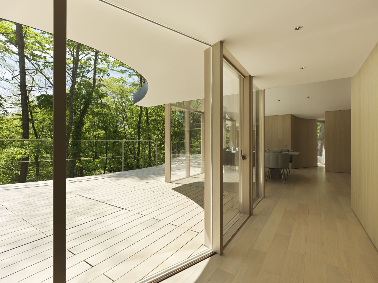 Nendo Builds Weekend House that Consists of Six Cottages, Intertwined With a Terrace and Roof