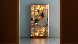 Penedo Cabinet has Backlights Illuminating Patagonia Granite Veins