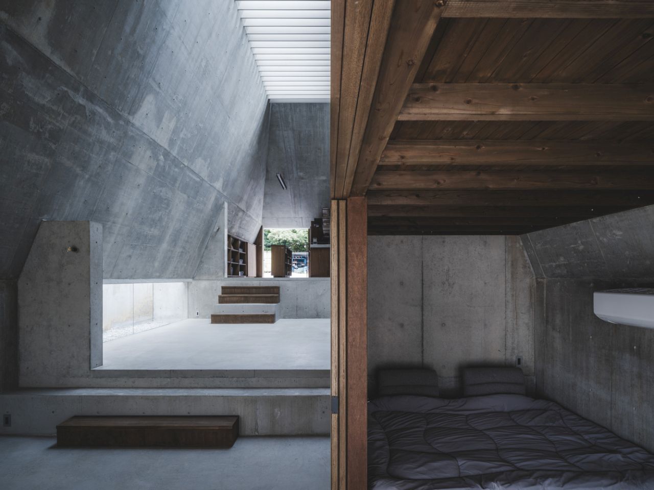 This Concrete House in Japan Embraces a Pyramid Shape to Adapt to its Sloping Site