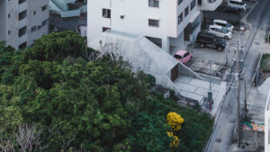 This Concrete House in Japan Embraces a Pyramid Shape to Adapt to its Sloping Site