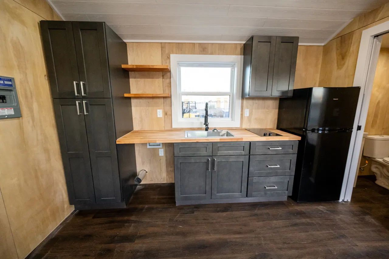 TinyPlex Tiny House black unit kitchen