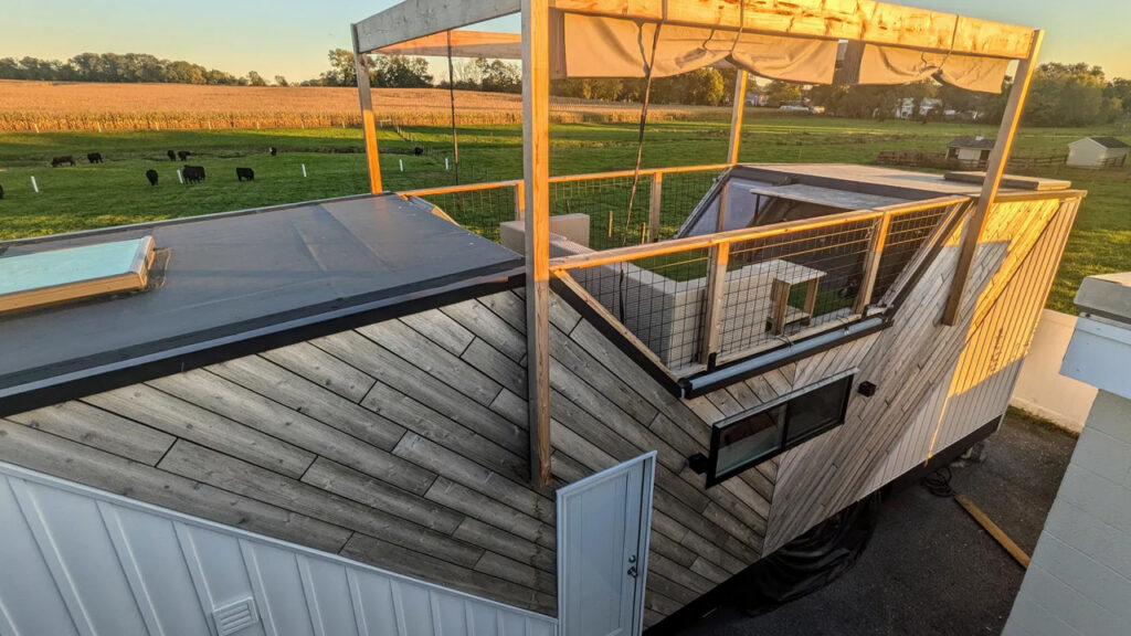 34ft Tiny House Has Rooftop Deck With Detachable Pergola