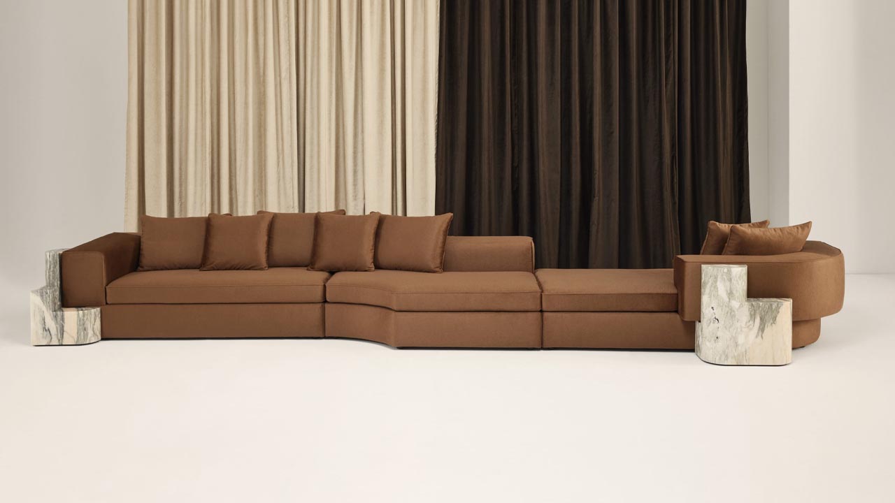 the Orbe collection of sofas and armchairs designed by Anthony Guerrée for La Chance Paris. Meant to be used as a modular system, the collection is distinguished with movable marble elements.