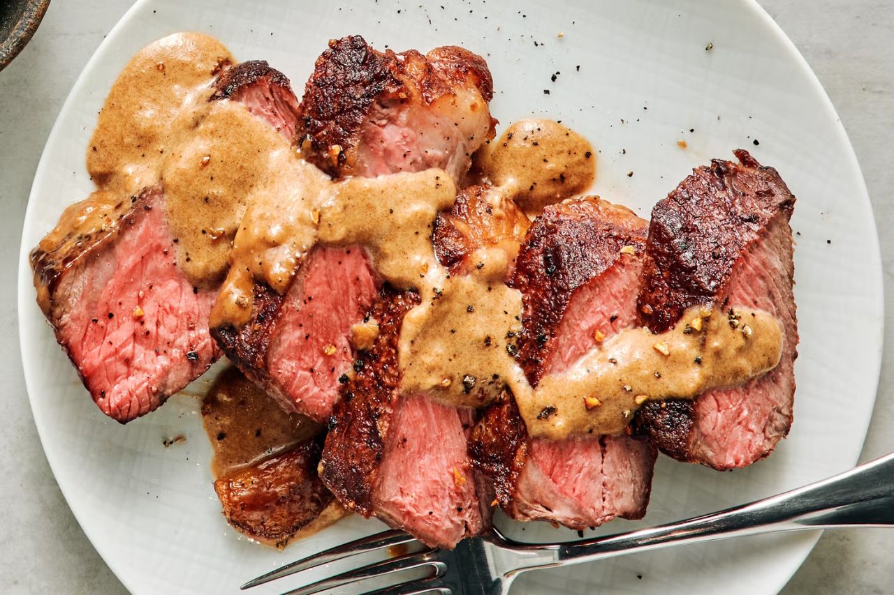 Steak With Bourbon Garlic Cream Sauce