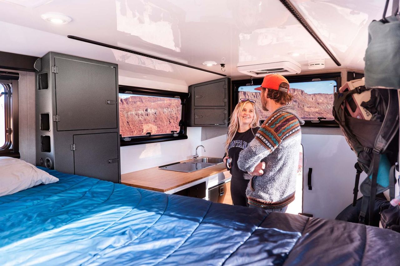 Supertramp Launches Flagship HT Truck Camper - two people standing inside