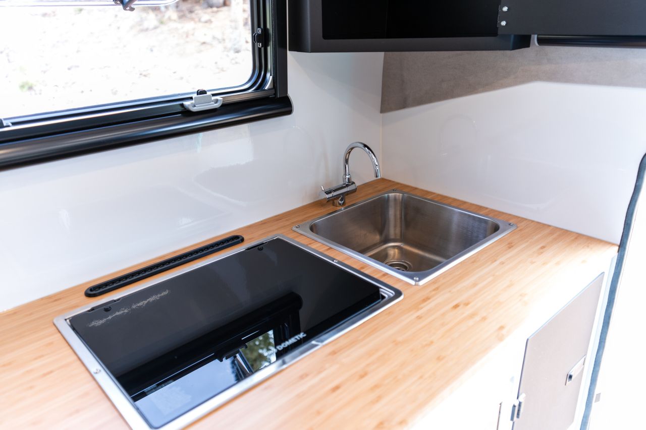 Supertramp Launches Flagship HT Truck Camper - kitchen sink and cooktop