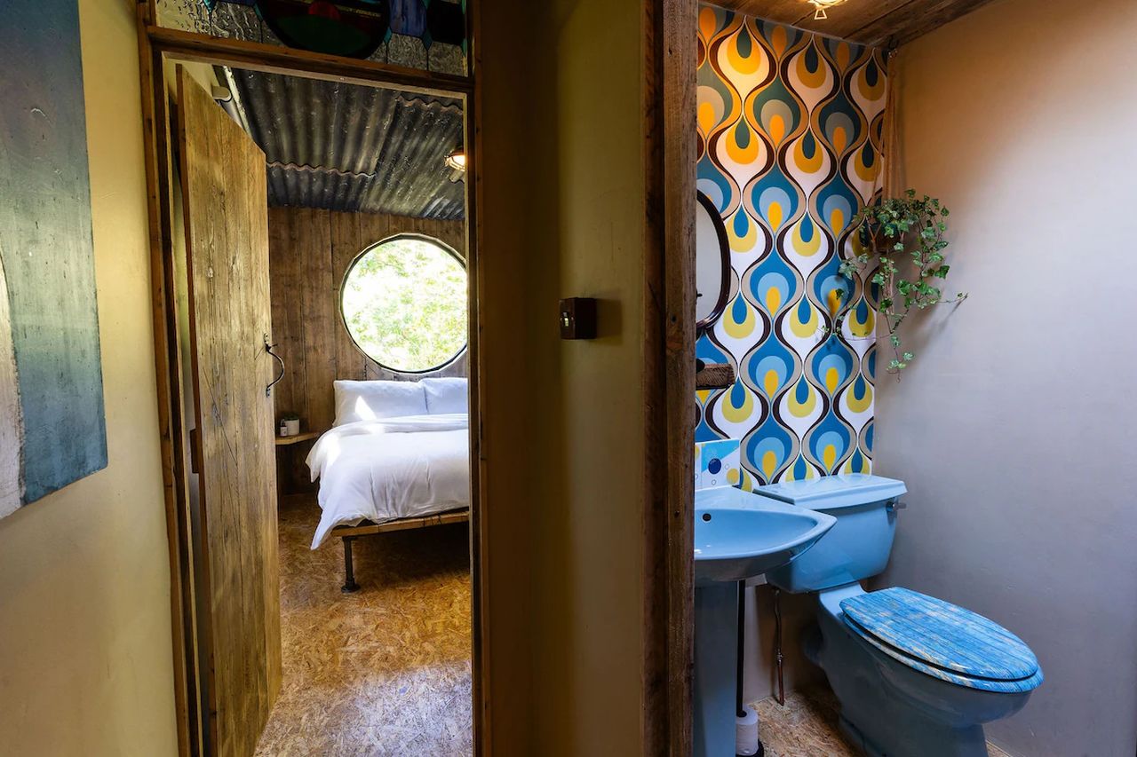 Bathroom and Bedroom of Evergreen Cabin